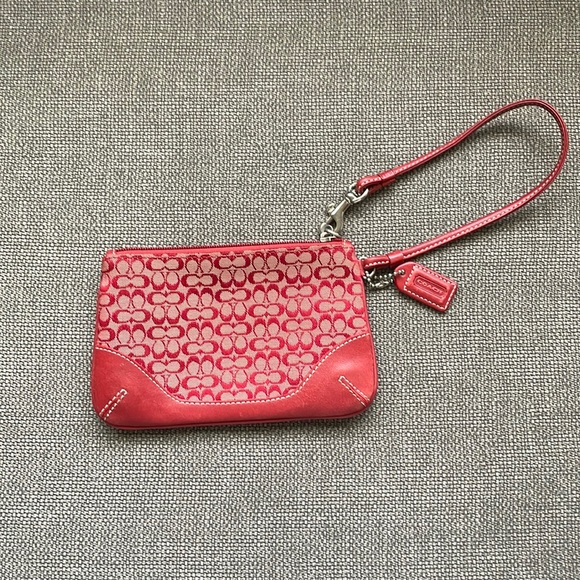 Coach Handbags - Authentic Coach red leather wristlet. zip closure. excellent condition.